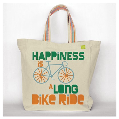 Heavyweight cotton tote with ribbon accented handles and silkscreened graphics.