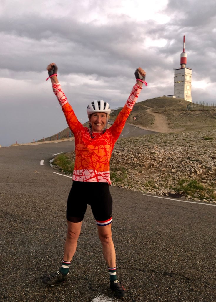 Celebrating victory over mont ventoux, a 26 kilometer climb in Provence, France