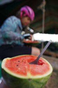 Fresh fruit is abundant along the roadside, a delicious convenience for cyclists in Thailand