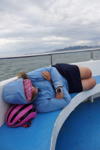 Taking a nap on the boat, ferry ride to Phi Phi Islands, Thailand