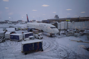 Our plane in the snow, ready to load, and take us far from wintry weather
