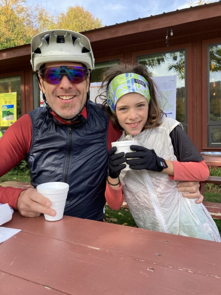 Tyler and his daughter enjoying some hot chocolate at Richard’s Ride, 2021