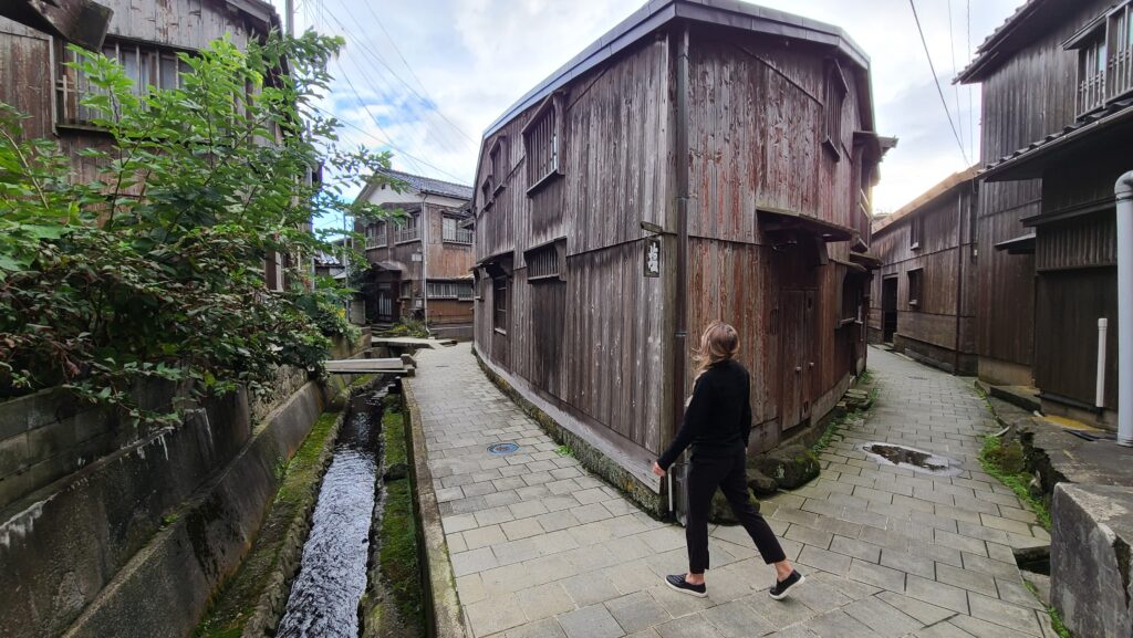 Ancient wooden houses on narrow streets in Shukenegi Fishing Village, Sado Island