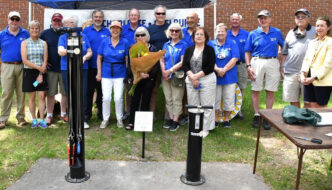 Rotary members at the deication of the bike repair station in Shelburne, Vermont