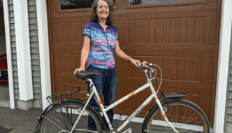 Annie with her newly restored Peugeot mixte commuter bike, compete with Terry Liberator X Gel Italia saddle